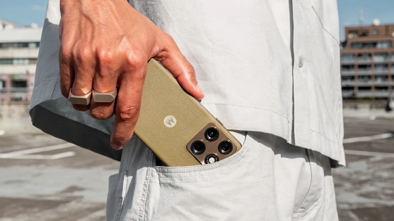 Motorola Edge 2026 in Pantone Martini Olive showing front display and triple camera system